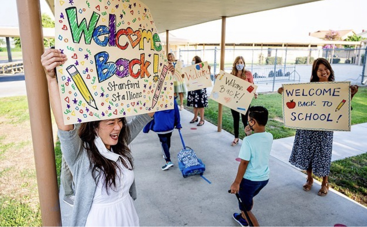 Teachers welcome students back to school!